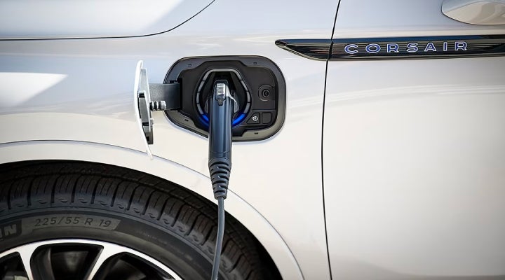 An electric charger is shown plugged into the charging port of a Lincoln Corsair® Grand Touring
model. | Gary Yeomans Lincoln Ocala in Ocala FL